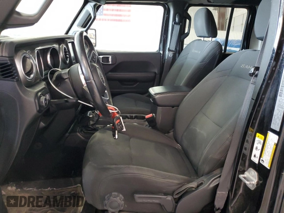 2018 Jeep Wrangler Unlimited Sahara with VIN 1C4HJXEN1JW222834, listed as a Copart auction lot 51837705 with 70,713 mi miles and Salvage title. Bid and sale history available at DreamBid. Image 7.