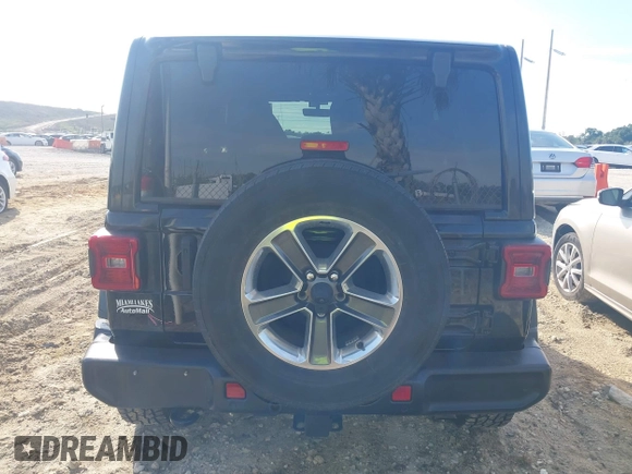 2021 Jeep Wrangler Unlimited Sahara with VIN 1C4HJXEG3MW536507, listed as a IAAI auction lot 41601893 with 51,214 mi miles and . Bid and sale history available at DreamBid. Image 16.