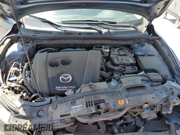 2018 Mazda 3 Touring z VIN 3MZBN1V35JM238103, wystawiony jako Copart lot #56770875 z przebiegiem 66 747 mil mil oraz Szkoda całkowita • Salvage title. Historia ofert i sprzedaży dostępna na DreamBid. Obrazek 11.