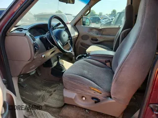 1997 Ford F-150 XL z VIN 1FTDX186XVKB29967, wystawiony jako Copart lot #63531805 z przebiegiem 178 616 mil mil oraz Czysty tytuł • Clean title. Historia ofert i sprzedaży dostępna na DreamBid. Obrazek 7.