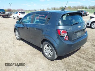 2013 Chevrolet Sonic LT with VIN 1G1JC6SH8D4135428, listed as a IAAI auction lot 41983682 with 255,918 mi miles. Bid and sale history available at carsss.com. Image 3.