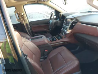 2015 Chevrolet Tahoe LTZ with VIN 1GNSKCKC2FR106098, listed as a IAAI auction lot 41031110 with 167,172 mi miles. Bid and sale history available at carsss.com. Image 5.
