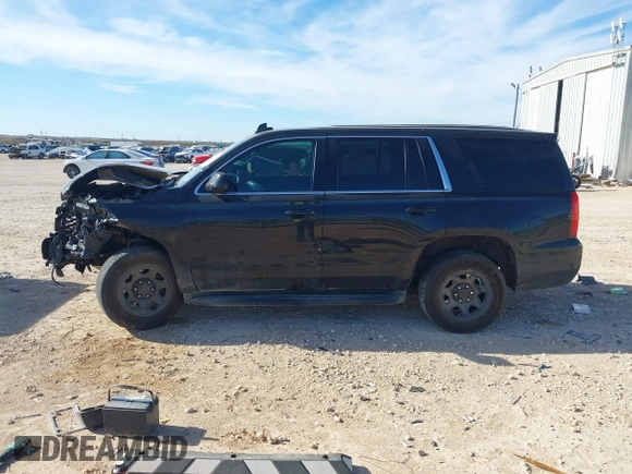 2019 Chevrolet Tahoe Commercial z VIN 1GNLCDEC4KR295348, wystawiony jako IAAI lot #41225134 z przebiegiem Nie podano mil oraz . Historia ofert i sprzedaży dostępna na DreamBid. Obrazek 14.