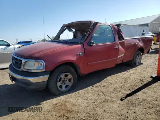 2000 Ford F-150 XL with VIN 1FTZX1728YNA87502, listed as a Copart auction lot 54870295 with 219,971 mi miles and Salvage title. Bid and sale history available at DreamBid. Image 1.