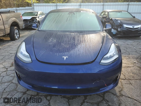 2019 Tesla Model 3 Mid Range z VIN 5YJ3E1EA2KF476194, wystawiony jako Copart lot #51140115 z przebiegiem Nie podano mil oraz Szkoda całkowita • Salvage title. Historia ofert i sprzedaży dostępna na DreamBid. Obrazek 5.