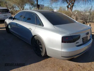 2011 Audi A8 z VIN WAURVAFD4BN020585, wystawiony jako IAAI lot #41841459 z przebiegiem 110 536 mil mil oraz . Historia ofert i sprzedaży dostępna na DreamBid. Obrazek 3.