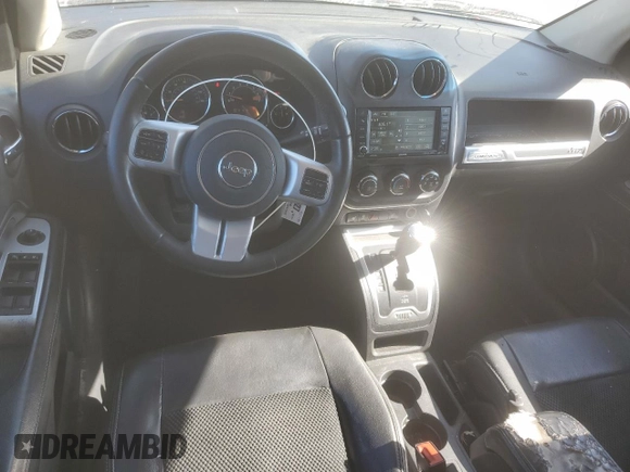 2014 Jeep Compass Latitude with VIN 1C4NJCEBXED509530, listed as a Copart auction lot 46624785 with 162,981 mi miles and Salvage Title. Bid and sale history available at DreamBid. Image 8.