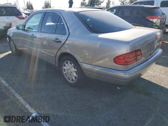 1998 Mercedes-Benz E-Class with VIN WDBJF65FXWA497997, listed as a Copart auction lot 87969125 with 145,322 mi miles and Salvage Title. Bid and sale history available at carsss.com. Image 2.
