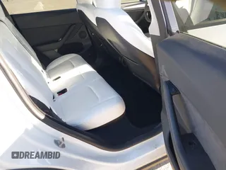 2023 Tesla Model Y Performance with VIN 7SAYGDEF2PF754938, listed as a IAAI auction lot 42067041 with 21,103 mi miles and . Bid and sale history available at DreamBid. Image 8.
