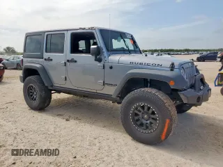 2015 Jeep Wrangler Unlimited Rubicon z VIN 1C4BJWFG0FL529310, wystawiony jako Copart lot #64337405 z przebiegiem Nie podano mil oraz Szkoda całkowita • Salvage title. Historia ofert i sprzedaży dostępna na DreamBid. Obrazek 4.