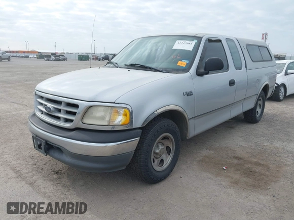 1999 Ford F-150 with VIN 1FTZX1720XKA10512, listed as a IAAI auction lot 41247083 with 169,154 mi miles and . Bid and sale history available at DreamBid. Image 2.