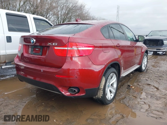 2012 BMW X6 35i z VIN 5UXFG2C54CL779333, wystawiony jako IAAI lot #41914135 z przebiegiem 63 305 mil mil oraz . Historia ofert i sprzedaży dostępna na DreamBid. Obrazek 4.