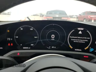 2021 Porsche Taycan z VIN WP0AA2Y1XMSA19047, wystawiony jako Copart lot #53094735 z przebiegiem 58 025 mil mil oraz Szkody całkowita. Historia ofert i sprzedaży dostępna na DreamBid. Obrazek 9.