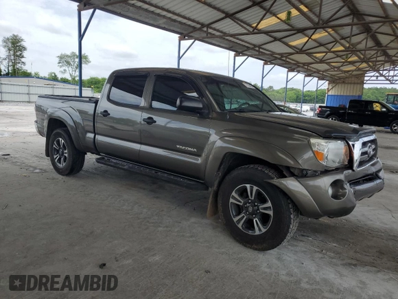 2009 Toyota Tacoma PreRunner with VIN 3TMKU72N89M021378, listed as a Copart auction lot 57142405 with 199,745 mi miles and Salvage title. Bid and sale history available at DreamBid. Image 4.