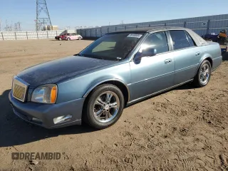 2000 Cadillac DeVille DTS z VIN 1G6KF5791YU245213, wystawiony jako Copart lot #76109884 z przebiegiem 138 131 mil mil oraz Szkoda całkowita • Salvage title. Historia ofert i sprzedaży dostępna na DreamBid. Obrazek 1.