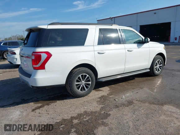 2021 Ford Expedition Max XLT with VIN 1FMJK1JT3MEA38310, listed as a IAAI auction lot 41511993 with 64,786 mi miles and . Bid and sale history available at DreamBid. Image 4.
