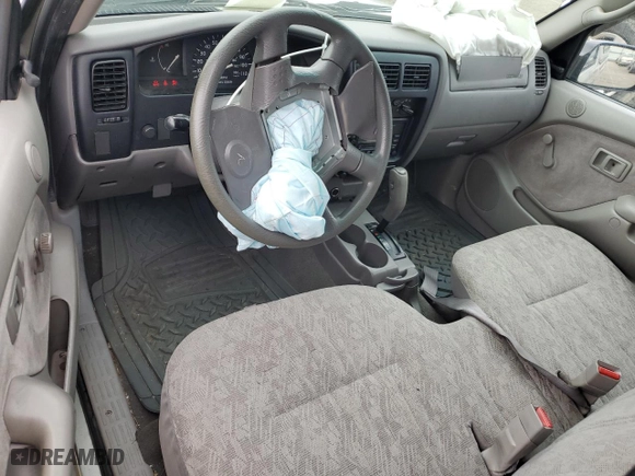 2002 Toyota Tacoma with VIN 5TENL42N62Z003551, listed as a Copart auction lot 52614765 with 212,317 mi miles and Salvage Title. Bid and sale history available at carsss.com. Image 8.