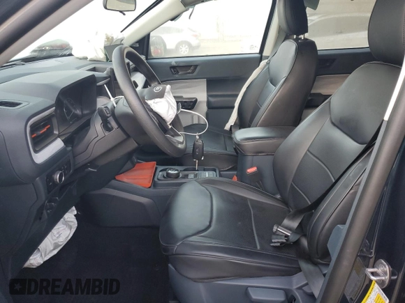 2023 Ford Maverick XL with VIN 3FTTW8F93PRA24562, listed as a Copart auction lot 77550714 with 7,972 mi miles and Salvage title. Bid and sale history available at DreamBid. Image 7.