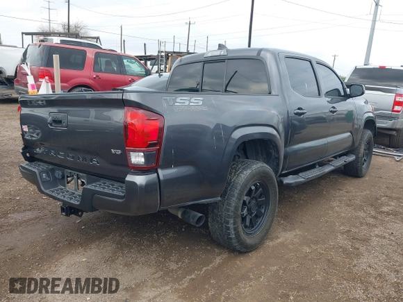 2023 Toyota Tacoma SR with VIN 3TYCZ5AN5PT138770, listed as a IAAI auction lot 41461423 with 19,785 mi miles and . Bid and sale history available at DreamBid. Image 4.