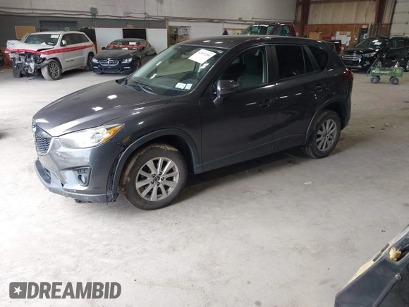 2015 Mazda CX-5 Touring with VIN JM3KE4CY6F0510002, listed as a IAAI auction lot 42045284 with 88,949 mi miles and . Bid and sale history available at DreamBid. Image 18.