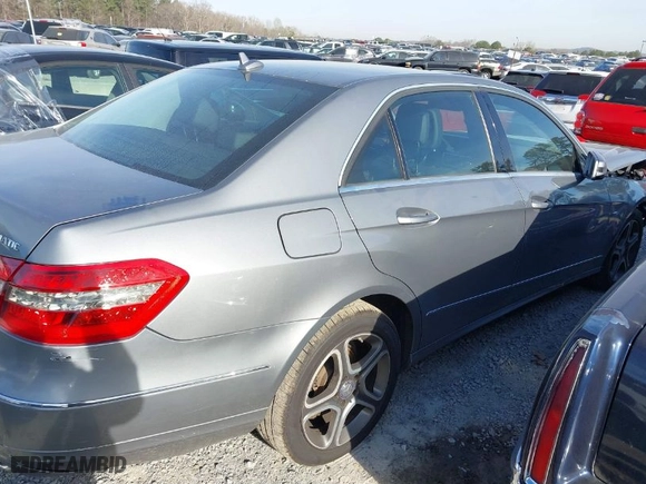 2012 Mercedes-Benz E-Class E 350 Luxury with VIN WDDHF8JB9CA568297, listed as a IAAI auction lot 41816749 with 157,328 mi miles. Bid and sale history available at carsss.com. Image 13.