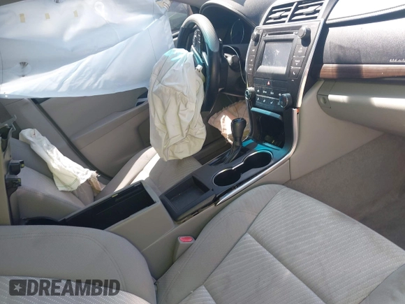 2016 Toyota Camry XLE with VIN 4T4BF1FK3GR535768, listed as a IAAI auction lot 41988698 with 157,452 mi miles. Bid and sale history available at carsss.com. Image 5.