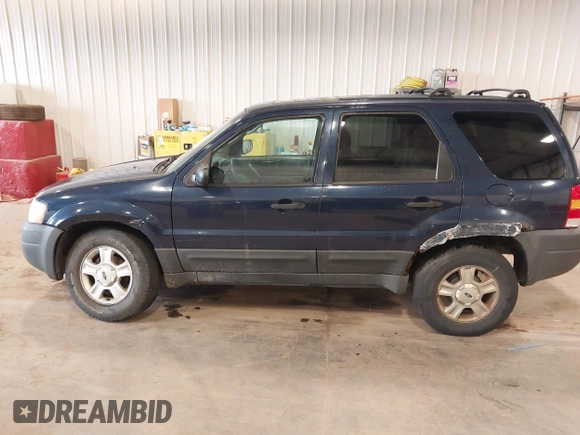 2004 Ford Escape XLT with VIN 1FMYU93134KB36712, listed as a IAAI auction lot 42412101 with 232,340 mi miles and . Bid and sale history available at DreamBid. Image 14.