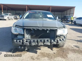 2019 Chrysler 300 Limited with VIN 2C3CCAEG6KH698021, listed as a IAAI auction lot 41780227 with 127,714 mi miles and . Bid and sale history available at DreamBid. Image 13.