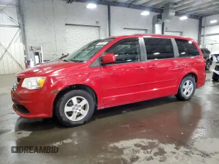2012 Dodge Grand Caravan SXT with VIN 2C4RDGCG9CR406057, listed as a Copart auction lot 54263635 with 153,929 mi miles and Salvage Title. Bid and sale history available at DreamBid. Image 1.