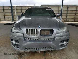 2012 BMW X6 50i z VIN 5UXFG8C53CL590742, wystawiony jako Copart lot #52072205 z przebiegiem 98 177 mil mil oraz Tytuł czysty. Historia ofert i sprzedaży dostępna na DreamBid. Obrazek 5.