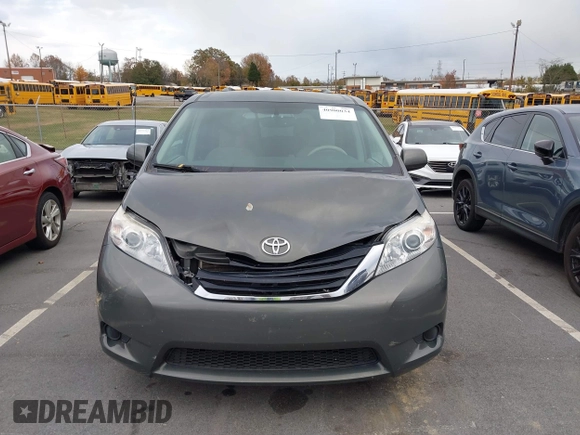 2012 Toyota Sienna LE AAS with VIN 5TDKK3DC5CS253020, listed as a IAAI auction lot 40900034 with 208,421 mi miles. Bid and sale history available at carsss.com. Image 12.