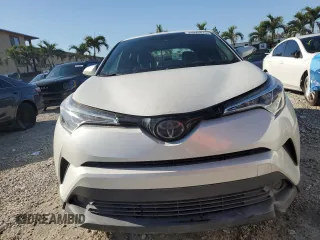2019 Toyota C-HR XLE z VIN JTNKHMBX7K1014151, wystawiony jako Copart lot #50699475 z przebiegiem 102 995 mil mil oraz Czysty tytuł • Clean title. Historia ofert i sprzedaży dostępna na DreamBid. Obrazek 5.