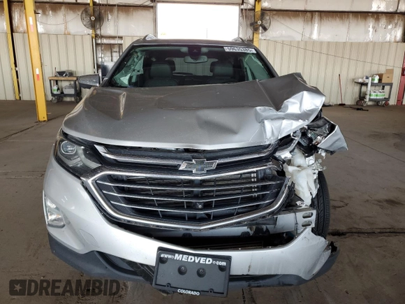 2019 Chevrolet Equinox Premier z VIN 3GNAXYEX3KS592663, wystawiony jako Copart lot #59635385 z przebiegiem 70 575 mil mil oraz Szkoda całkowita • Salvage title. Historia ofert i sprzedaży dostępna na DreamBid. Obrazek 5.