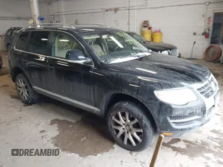 2010 Volkswagen Touareg VR6 with VIN WVGBF7A98AD001383, listed as a IAAI auction lot 41552327 with 158,416 mi miles and . Bid and sale history available at DreamBid. Image 1.
