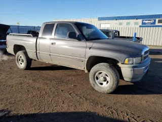 1999 Dodge Ram 1500 with VIN 3B7HF13Z4XG160048, listed as a Copart auction lot 84405374 with 237,247 mi miles and Salvage Title. Bid and sale history available at carsss.com. Image 4.