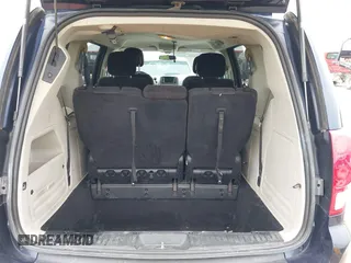 2015 Dodge Grand Caravan SXT with VIN 2C4RDGCG7FR524712, listed as a IAAI auction lot 41956063 with 111,144 mi miles and . Bid and sale history available at DreamBid. Image 17.