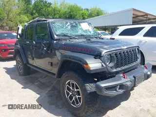 2024 Jeep Wrangler Rubicon with VIN 1C4PJXFG5RW259926, listed as a IAAI auction lot 42009249 with 37,988 mi miles. Bid and sale history available at carsss.com. Image 1.