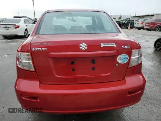 2013 Suzuki SX4 LE with VIN JS2YC5A36D6101956, listed as a Copart auction lot 84450374 with 61,704 mi miles and Salvage Title. Bid and sale history available at carsss.com. Image 6.