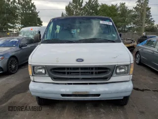 1999 Ford Econoline Passenger XL with VIN 1FBSS31L2XHA95612, listed as a Copart auction lot 72615104 with 211,283 mi miles and Salvage Title. Bid and sale history available at DreamBid. Image 5.