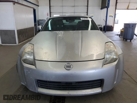 2003 Nissan 350Z Touring с VIN JN1AZ34D03T114076, выставлен на аукционе Copart как лот 61078255 с пробегом 187 952 миль миль и Списание • Salvage title. История ставок и продаж доступна на DreamBid. Изображение 5.