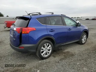 2014 Toyota RAV4 Limited with VIN 2T3DFREV2EW183123, listed as a Copart auction lot 65645535 with 74,997 mi miles and Salvage title. Bid and sale history available at DreamBid. Image 3.