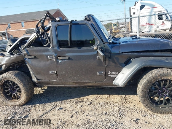 2019 Jeep Wrangler Unlimited Sport S with VIN 1C4HJXDGXKW500313, listed as a IAAI auction lot 41022680 with 82,864 mi miles and . Bid and sale history available at DreamBid. Image 13.