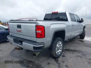 2019 GMC Sierra 2500HD Denali with VIN 1GT12SEY4KF243612, listed as a IAAI auction lot 41962727 with 71,936 mi miles. Bid and sale history available at carsss.com. Image 4.