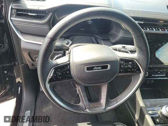 2021 Jeep Grand Cherokee Overland with VIN 1C4RJKDG7M8182214, listed as a IAAI auction lot 42796118 with 69,689 mi miles and . Bid and sale history available at DreamBid. Image 16.