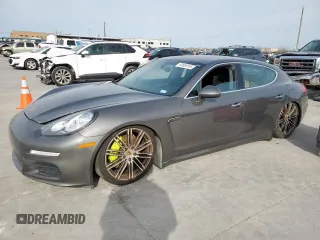 2015 Porsche Panamera S E-Hybrid z VIN WP0AD2A74FL040850, wystawiony jako Copart lot #47661515 z przebiegiem 86 767 mil mil oraz Tytuł czysty. Historia ofert i sprzedaży dostępna na DreamBid. Obrazek 1.