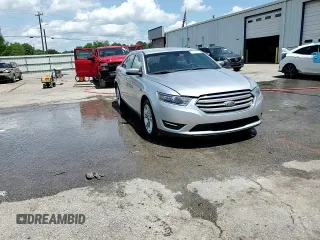 2018 Ford Taurus SEL z VIN 1FAHP2E85JG124787, wystawiony jako Copart lot #61688035 z przebiegiem 145 841 mil mil oraz Szkoda całkowita • Salvage title. Historia ofert i sprzedaży dostępna na DreamBid. Obrazek 13.