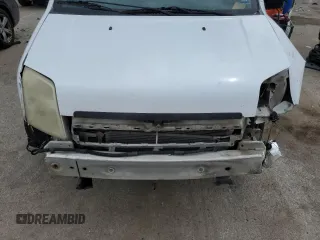 2010 Ford Transit Connect XLT with VIN NM0KS6BNXAT000034, listed as a Copart auction lot 54598985 with 133,444 mi miles and Salvage title. Bid and sale history available at DreamBid. Image 12.