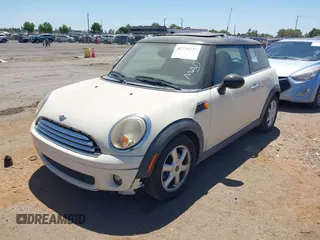 2010 MINI Hardtop with VIN WMWMF3C51ATZ23464, listed as a IAAI auction lot 42710259 with 124,660 mi miles and . Bid and sale history available at DreamBid. Image 2.