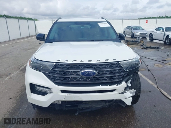 2022 Ford Explorer XLT z VIN 1FMSK7DHXNGB35329, wystawiony jako IAAI lot #42221442 z przebiegiem 56 655 mil mil oraz . Historia ofert i sprzedaży dostępna na DreamBid. Obrazek 12.