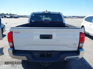 2018 Toyota Tacoma SR5 with VIN 5TFAZ5CN4JX056465, listed as a IAAI auction lot 41767848 with 71,532 mi miles and . Bid and sale history available at DreamBid. Image 17.